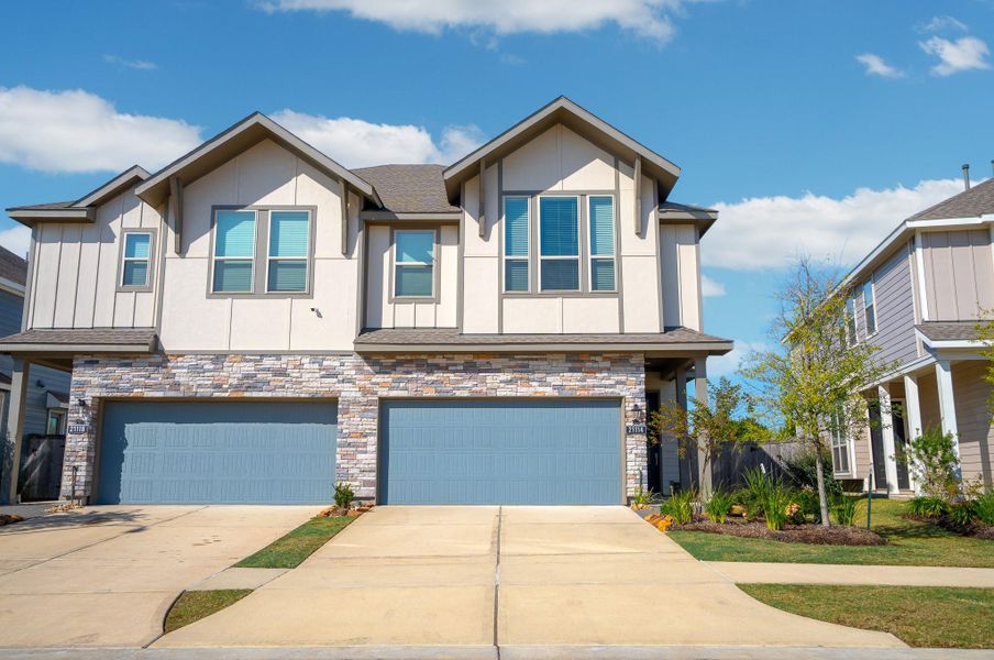 Front exterior of a new home in , Cypress, TX, highlighting curb appeal (Image 1). Front exterior of a new home in , Cypress, TX, highlighting curb appeal (Image 1).