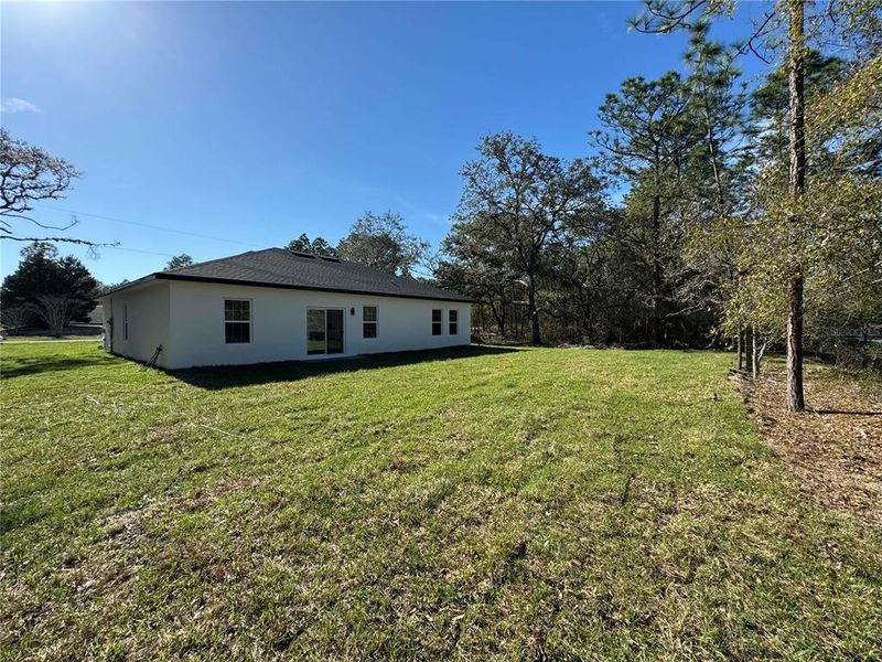 Exterior details and patio area of a home in , Citrus Springs (Image 23).