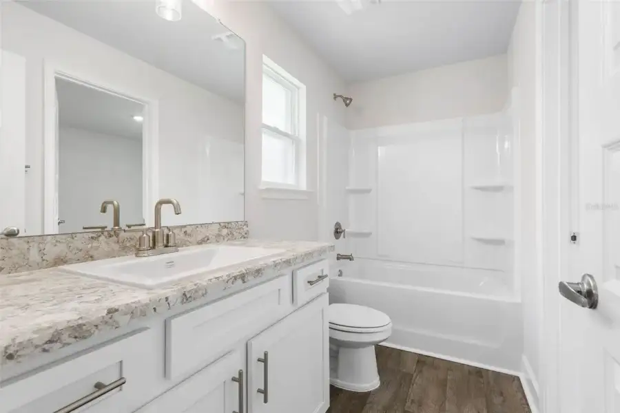 Representative furnished interior of a home built from the 2117 by Adams Homes in Flagler Estates, Hastings (Image 11).