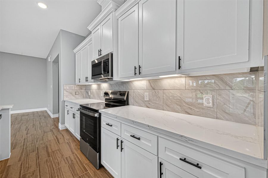 Furnished interior view inside a new home in , Prairie View (Image 11).