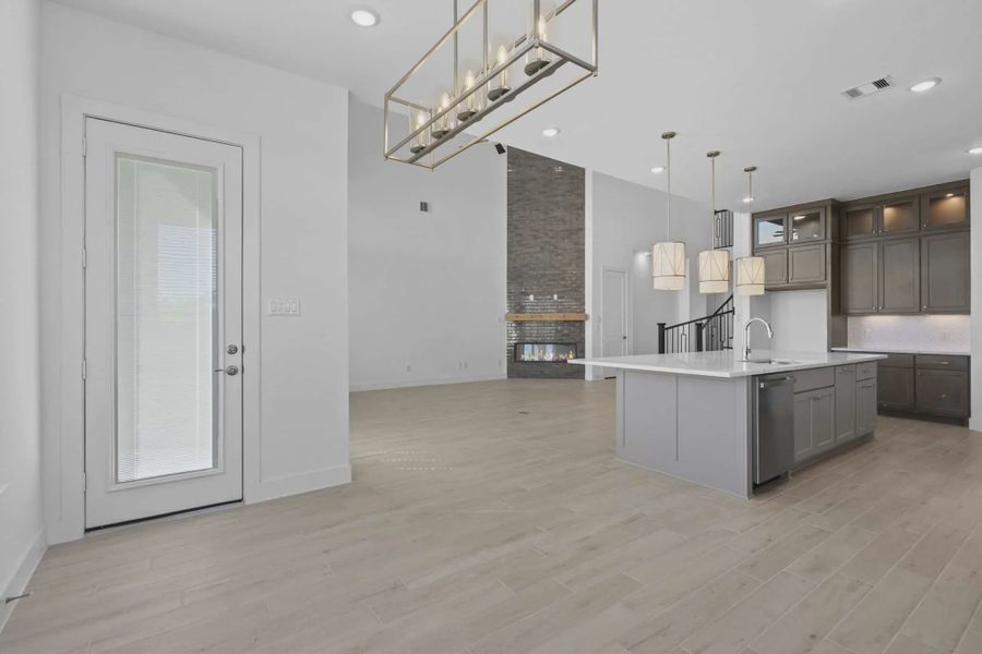 Representative furnished interior of a home built from the Waterford by Chesmar Homes in Meridiana 60's, Manvel (Image 11).