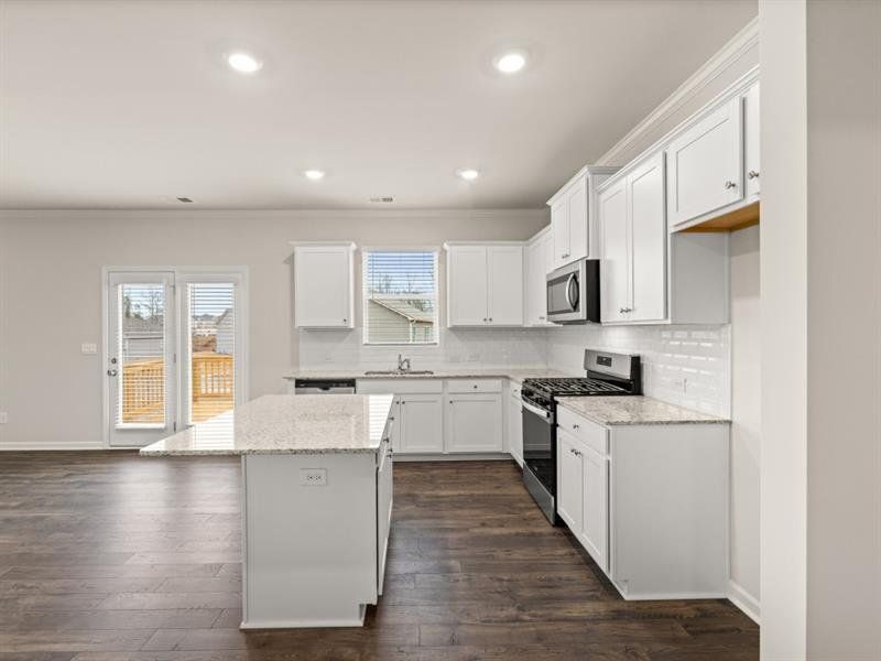 Furnished interior view inside a new home in Northwoods at Mirror Lake, Villa Rica (Image 8).