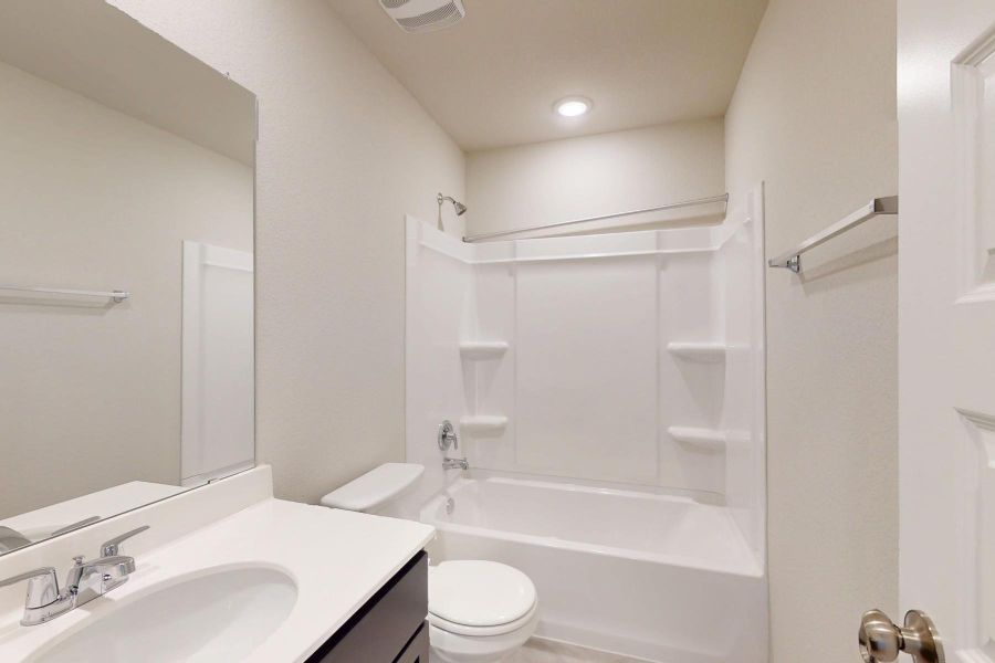 Furnished interior view inside a new home in Carillon, Manor (Image 11).