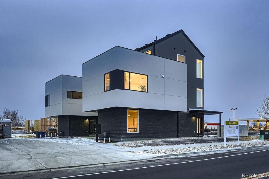 Front of home illuminated (before landscape was installed).