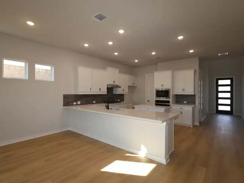 Furnished interior view inside a new home in Barksdale, Leander (Image 9). Furnished interior view inside a new home in Barksdale, Leander (Image 9).