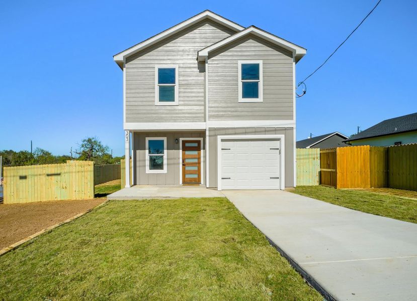 Front exterior of a new home in , Granite Shoals, TX, highlighting curb appeal (Image 2). Front exterior of a new home in , Granite Shoals, TX, highlighting curb appeal (Image 2).