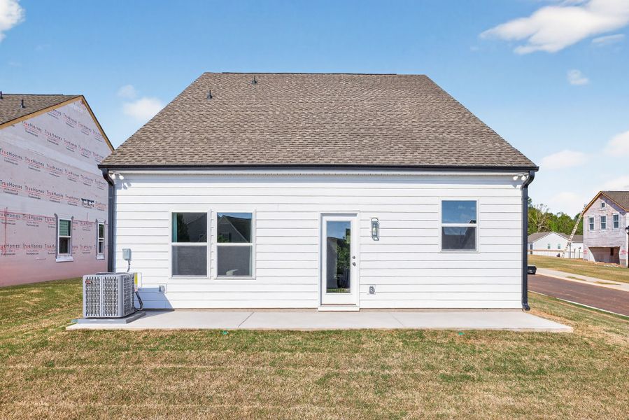 Exterior details and patio area of a home in Edgewater - Cottage Greens, Lancaster (Image 4).