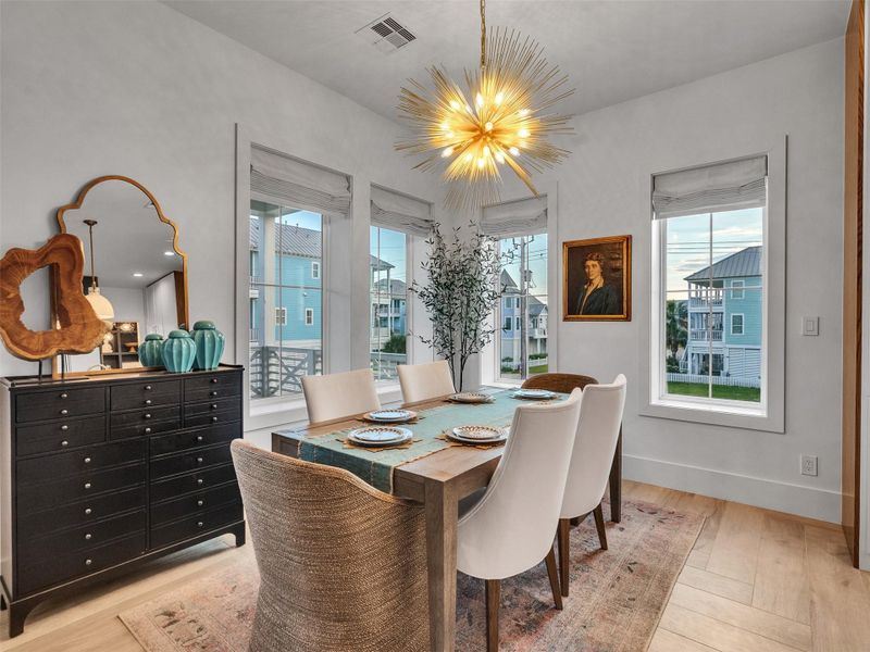 Gather in style at this gorgeous French Contemporary dining table by the Van Thiels, handcrafted from sandblasted American white oak for subtle texture and refined elegance. Set for six, it extends seamlessly to seat ten — perfect for hosting larger groups without breaking the flow. Combined with Lutron programmable lighting and automated shades, this space is ideal for intimate dinners, lively celebrations, or simply savoring the coastal ambiance with loved ones. Gather in style at this gorgeous French Contemporary dining table by the Van Thiels, handcrafted from sandblasted American white oak for subtle texture and refined elegance. Set for six, it extends seamlessly to seat ten — perfect for hosting larger groups without breaking the flow. Combined with Lutron programmable lighting and automated shades, this space is ideal for intimate dinners, lively celebrations, or simply savoring the coastal ambiance with loved ones.