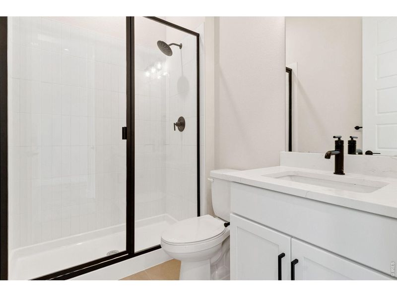 Furnished interior view inside a new home in RainDance, Windsor (Image 4).