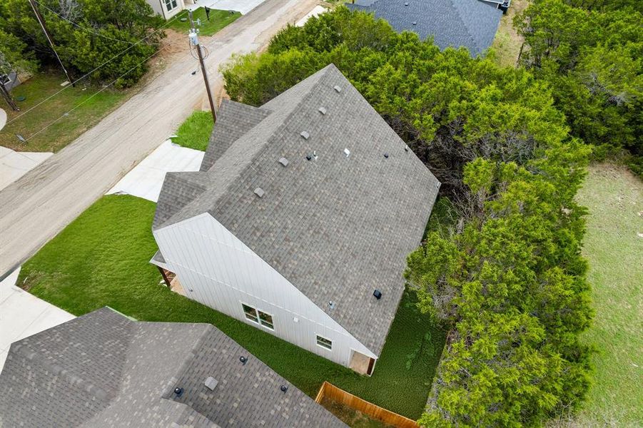 Front exterior of a new home in Canyon Creek, Granbury, TX, highlighting curb appeal (Image 22).