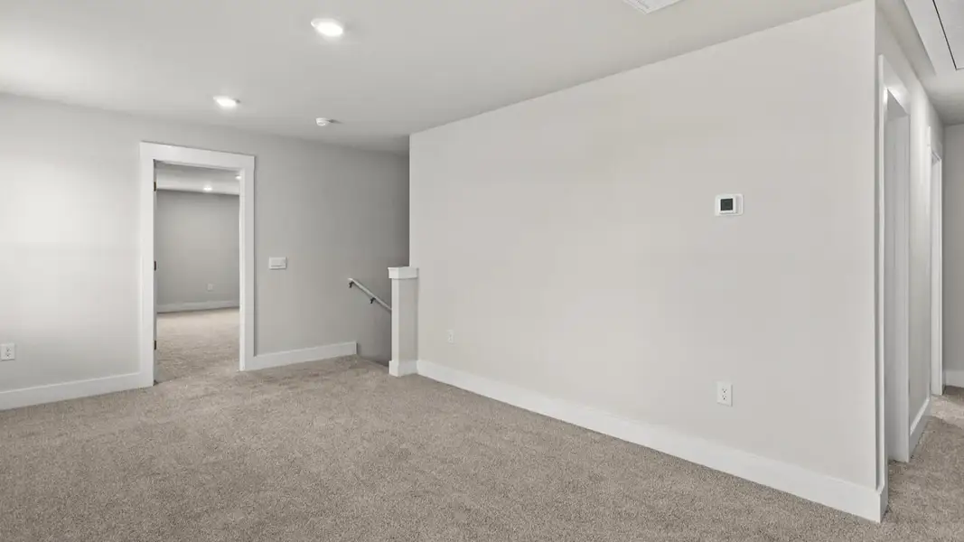 Representative unfurnished interior of a home built from the Wren by D.R. Horton in Saunders Village, Northwest (Image 21).