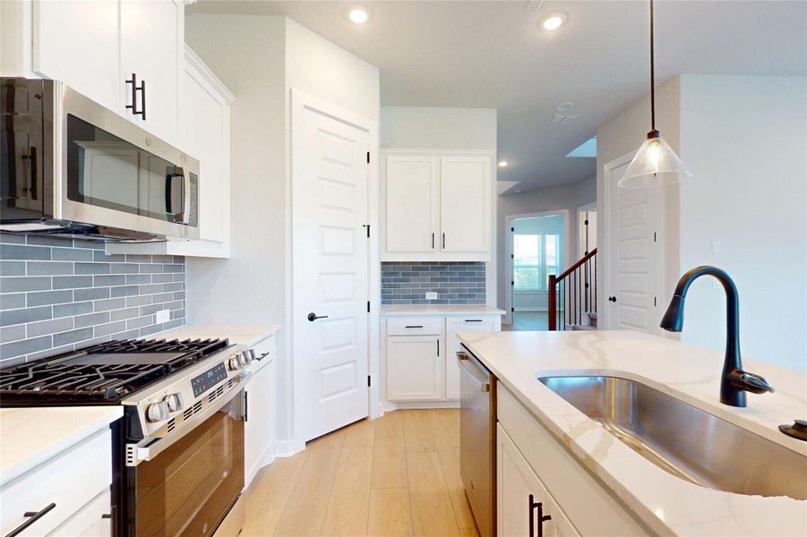 Furnished interior view inside a new home in Cedar Brook, Leander (Image 8).