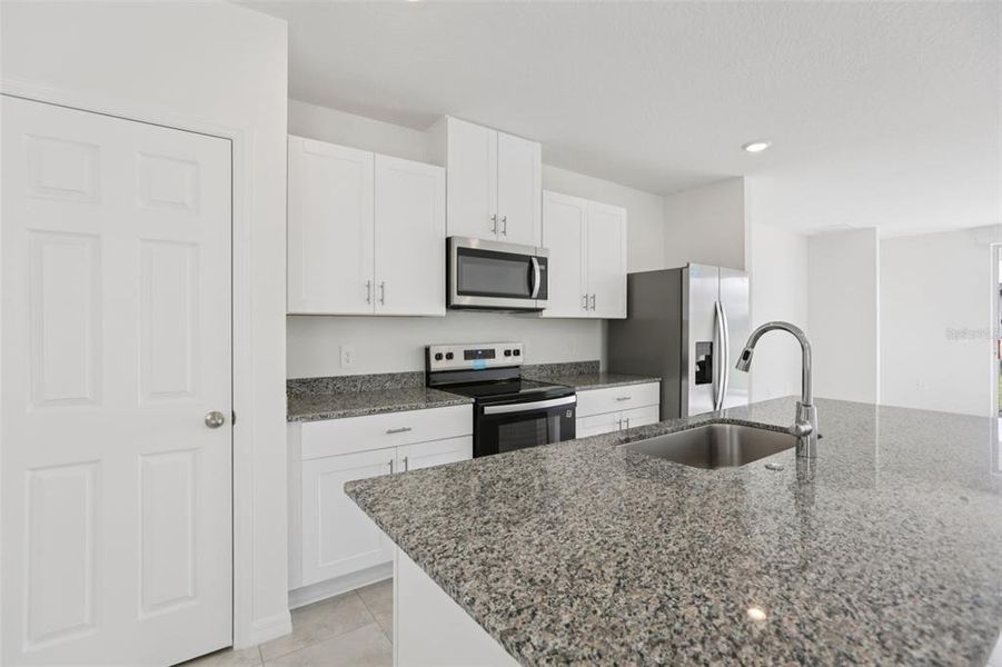 Furnished interior view inside a new home in Springs at Lake Alfred - Classic Series, Lake Alfred (Image 15).