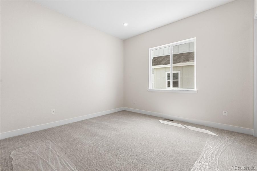 Spacious, unfurnished interior of a new home in Retreat at The Canyons, Castle Pines (Image 23).