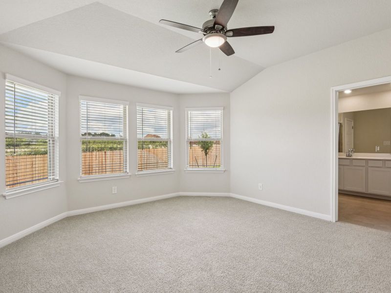 Primary suite in the Oleander floorplan at a Meritage Homes community.