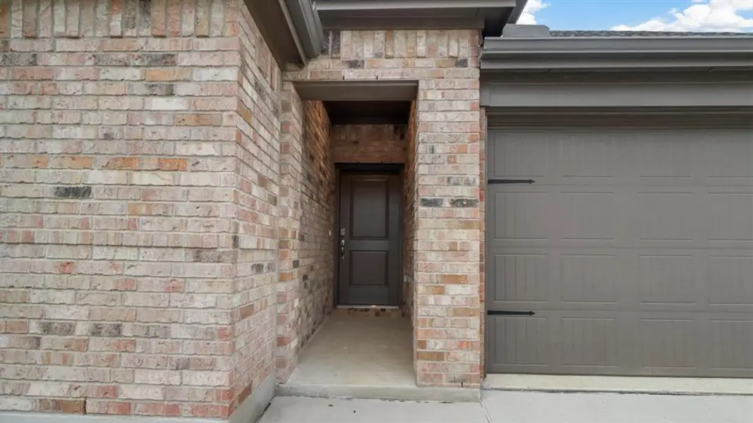 Exterior details and patio area of a home in Silverado, Aubrey (Image 1). Exterior details and patio area of a home in Silverado, Aubrey (Image 1).