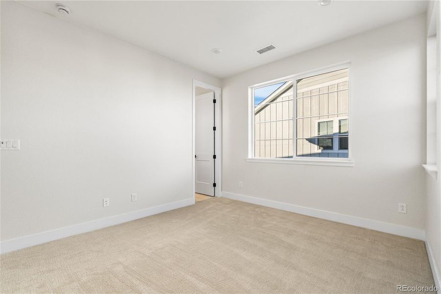 Spacious, unfurnished interior of a new home in Luxe at The Canyons, Castle Pines (Image 23).