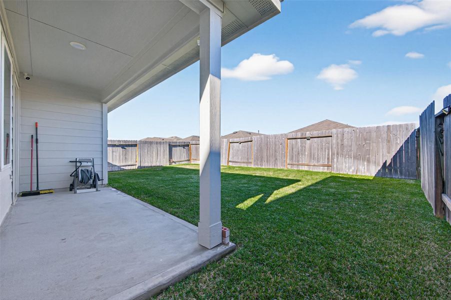 Exterior details and patio area of a home in , Spring (Image 3). Exterior details and patio area of a home in , Spring (Image 3).