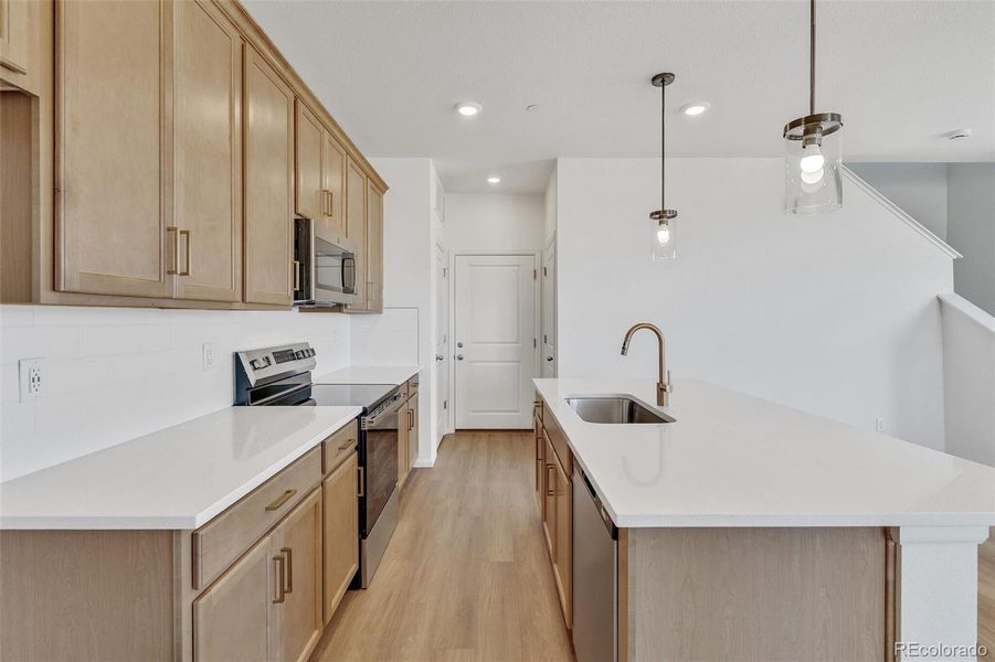 Furnished interior view inside a new home in Turnberry, Commerce City (Image 7).