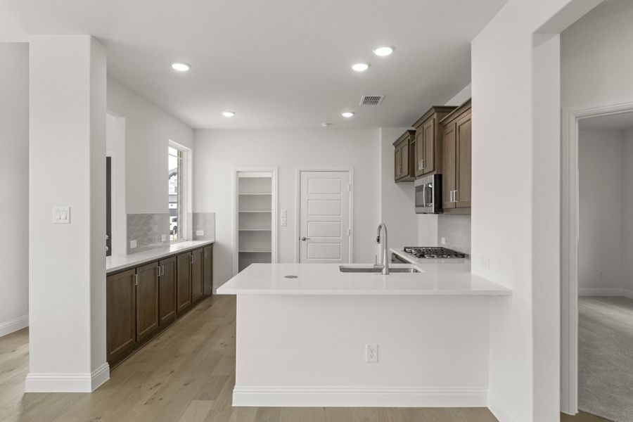 Furnished interior view inside a new home in The Reserve at Spiritas Ranch, Little Elm (Image 6).