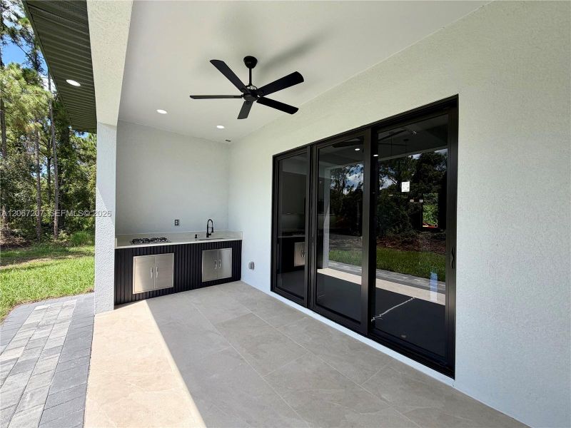 Exterior details and patio area of a home in , Lehigh Acres (Image 4). Exterior details and patio area of a home in , Lehigh Acres (Image 4).