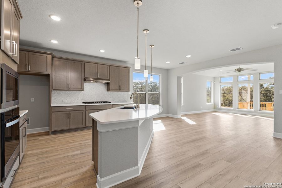 Furnished interior view inside a new home in The Enclave at Potranco Oaks, Castroville (Image 12).