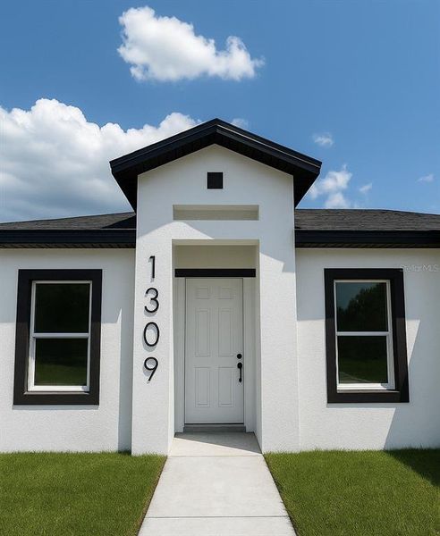 Front exterior of a new home in , Kissimmee, FL, highlighting curb appeal (Image 1). Front exterior of a new home in , Kissimmee, FL, highlighting curb appeal (Image 1).