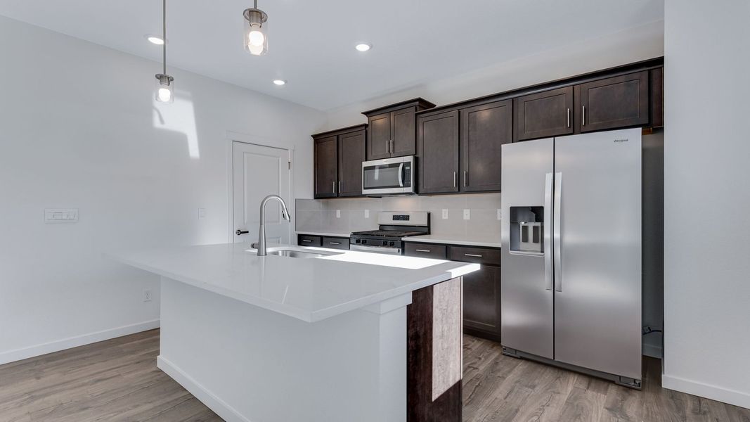 Furnished interior view inside a new home in Trails at Crowfoot, Parker (Image 5).