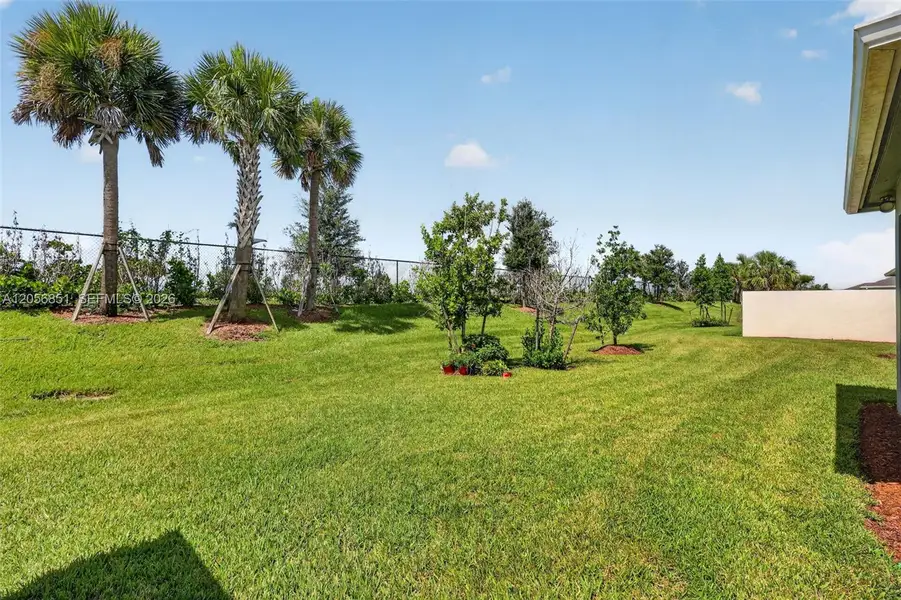 Exterior details and patio area of a home in , Port St. Lucie (Image 32).