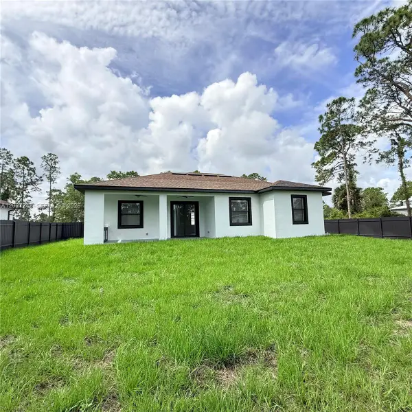 Exterior details and patio area of a home in , Lehigh Acres (Image 21).