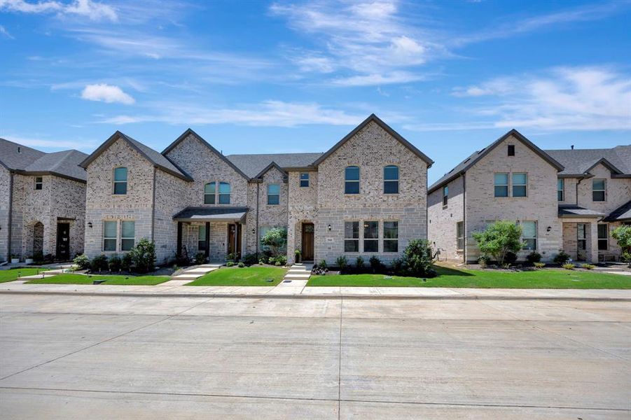 Fabulous End Unit with beautiful stone-brick exterior and curb appeal.