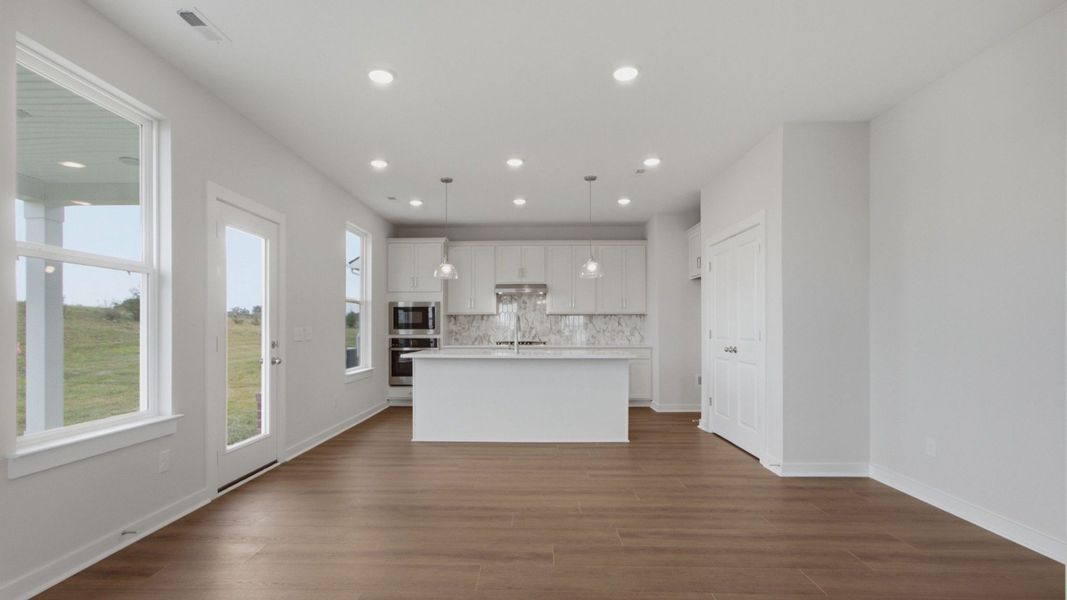 Open concept kitchen with space for dining/breakfast table