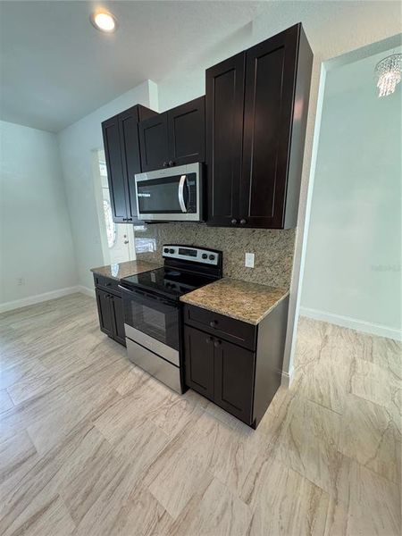 Furnished interior view inside a new home in , Deltona (Image 8).