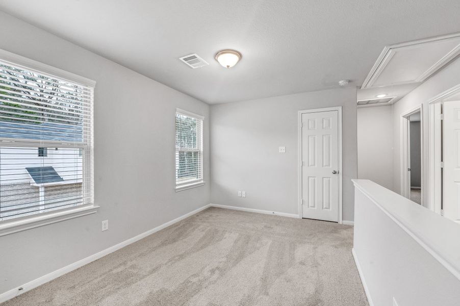 Representative unfurnished interior of a home built from the Floor Plan 1774 by Colina Homes in Rollingbrook Estates, Baytown (Image 20).