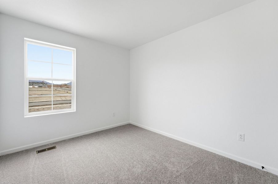 Spacious, unfurnished interior of a new home in Trailstone Townhomes - The Westerly Collection, Arvada (Image 15).