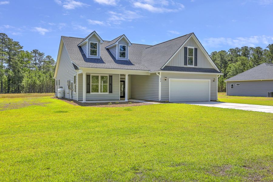 Front exterior of a new home in , Dorchester, SC, highlighting curb appeal (Image 2).