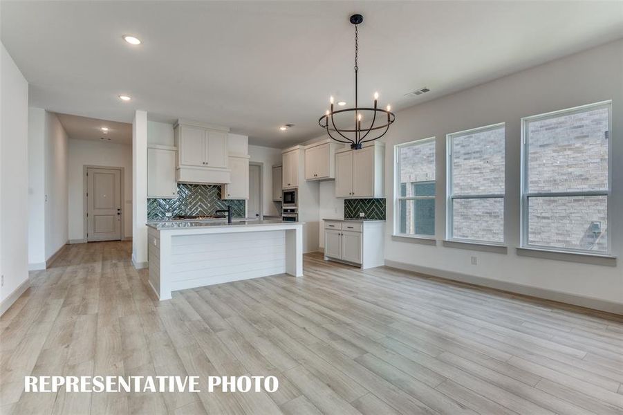 A dining space that is perfect for great dinner parties or cozy family meals.  REPRESENTATIVE PHOTO