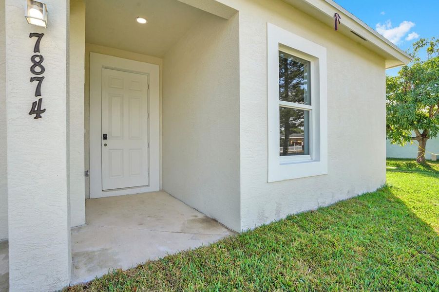 Exterior details and patio area of a home in , Lantana (Image 16).