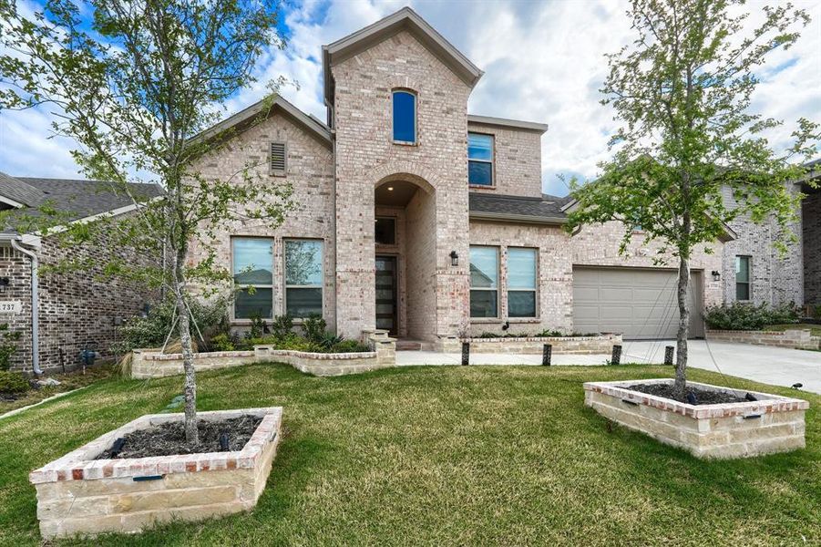 Front exterior of a new home in Cross Creek Meadows, Celina, TX, highlighting curb appeal (Image 26).