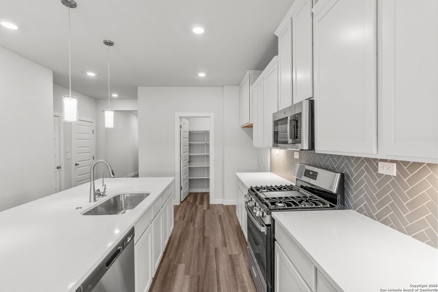 Furnished interior view inside a new home in August Fields, New Braunfels (Image 6).