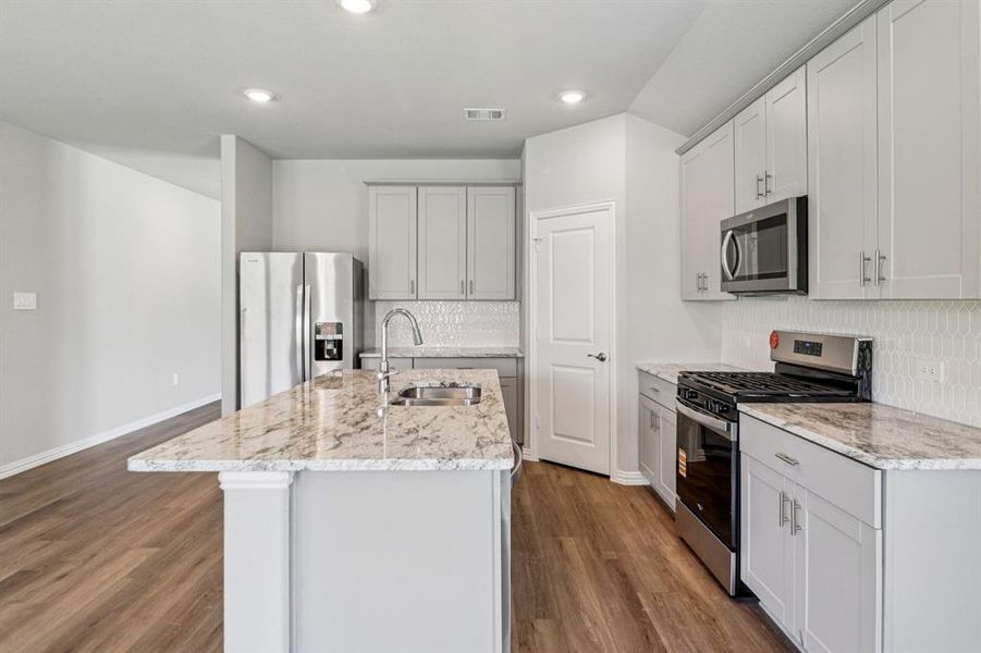 Photo is not of the actual home, but is an inspirational photo of builder’s model home and may depict options, furnishings, and/or decorator features that are not included.