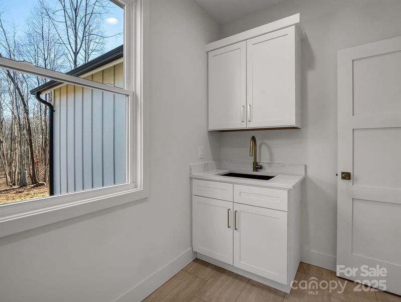 Laundry Room with sink and pocket door Laundry Room with sink and pocket door