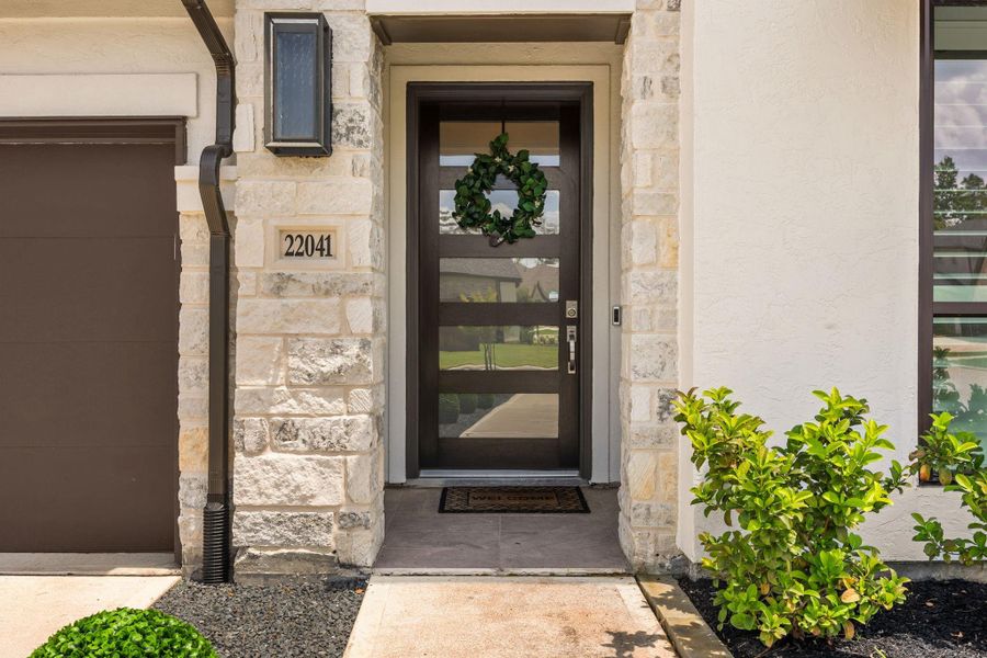 Exterior details and patio area of a home in The Highlands, Porter (Image 25).