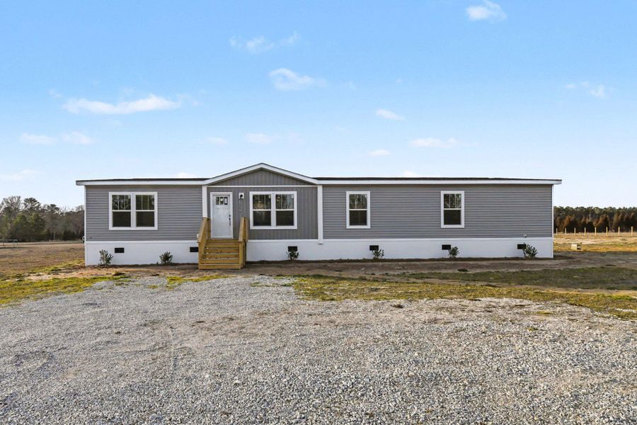 Exterior details and patio area of a home in , Ridgeville (Image 14). Exterior details and patio area of a home in , Ridgeville (Image 14).