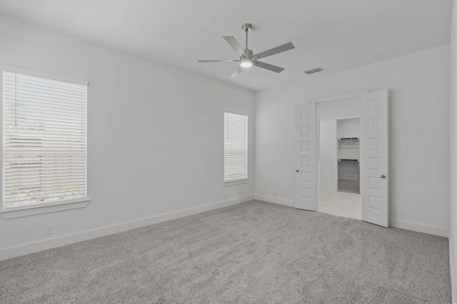 Representative unfurnished interior of a home built from the Hobson by Chesmar Homes in Buffalo Crossing, Cibolo (Image 11).