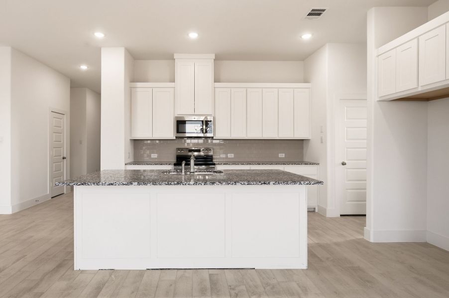Furnished interior view inside a new home in Saddleback Estates, Boyd (Image 8).