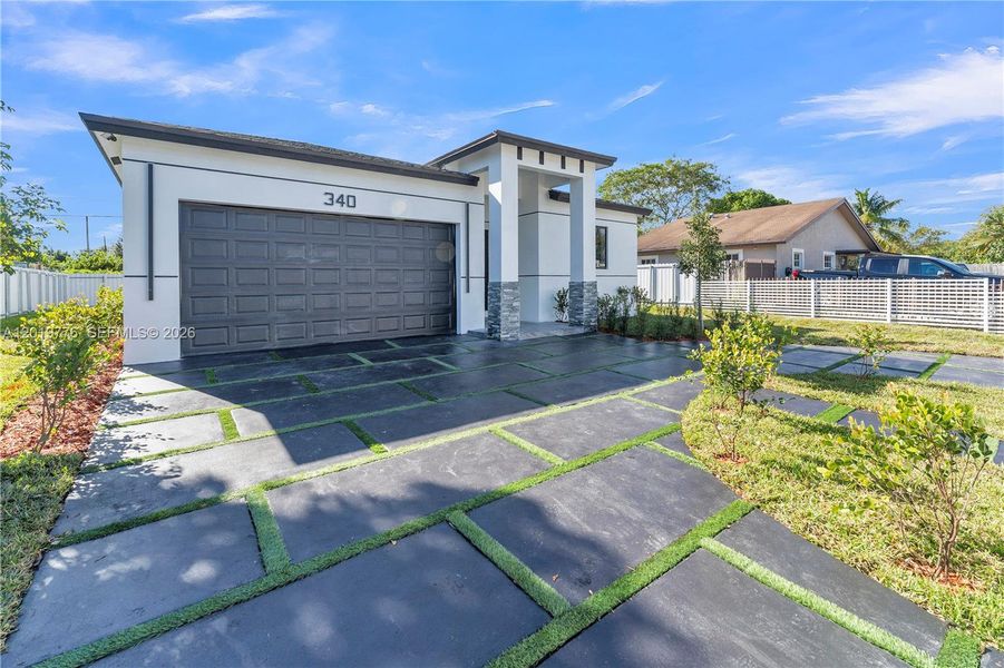 Front exterior of a new home in , Fort Lauderdale, FL, highlighting curb appeal (Image 26).