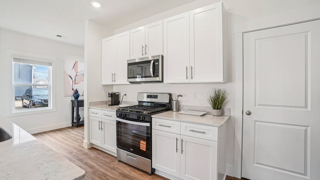 Furnished interior view inside a new home in The Hideaway at Fox Meadows, Bluff City (Image 10).