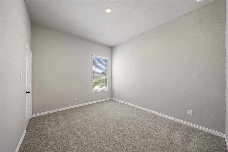 Spare room featuring carpet and recessed lighting Spare room featuring carpet and recessed lighting