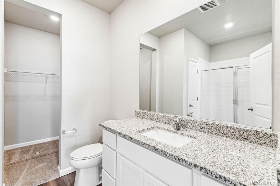 Furnished interior view inside a new home in Second Creek Farm, Commerce City (Image 9).